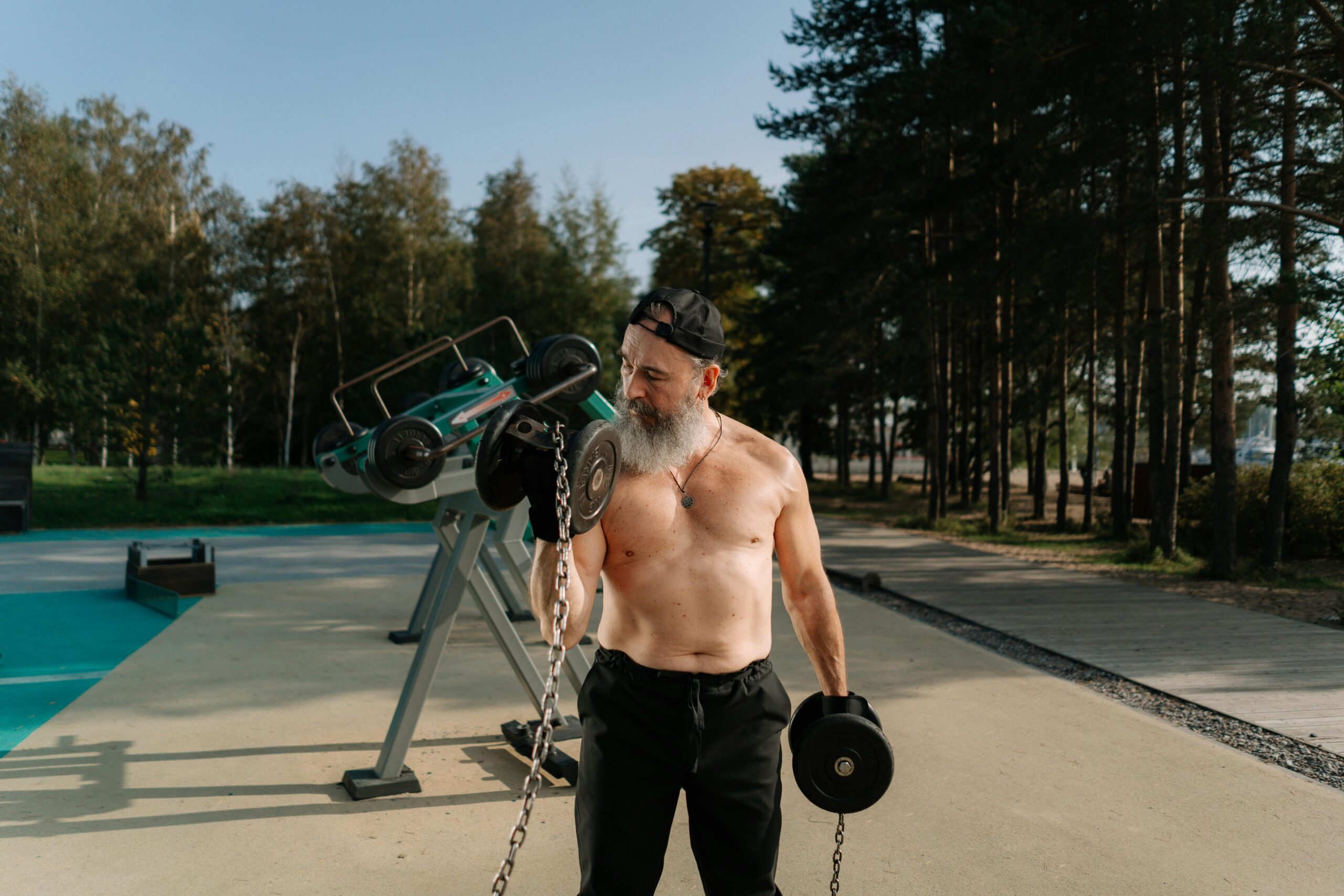 A Man Lifting Dumbbells